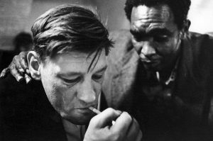 Black Alber comforts his friend Danny in St Botolph's Crypt wet shelter 1976.